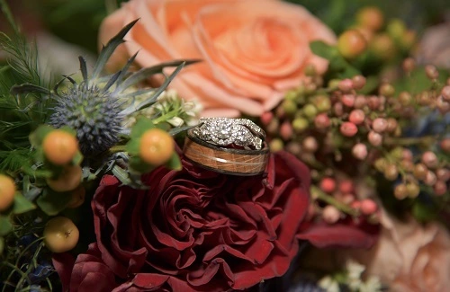 a bouquet of flowers with rings